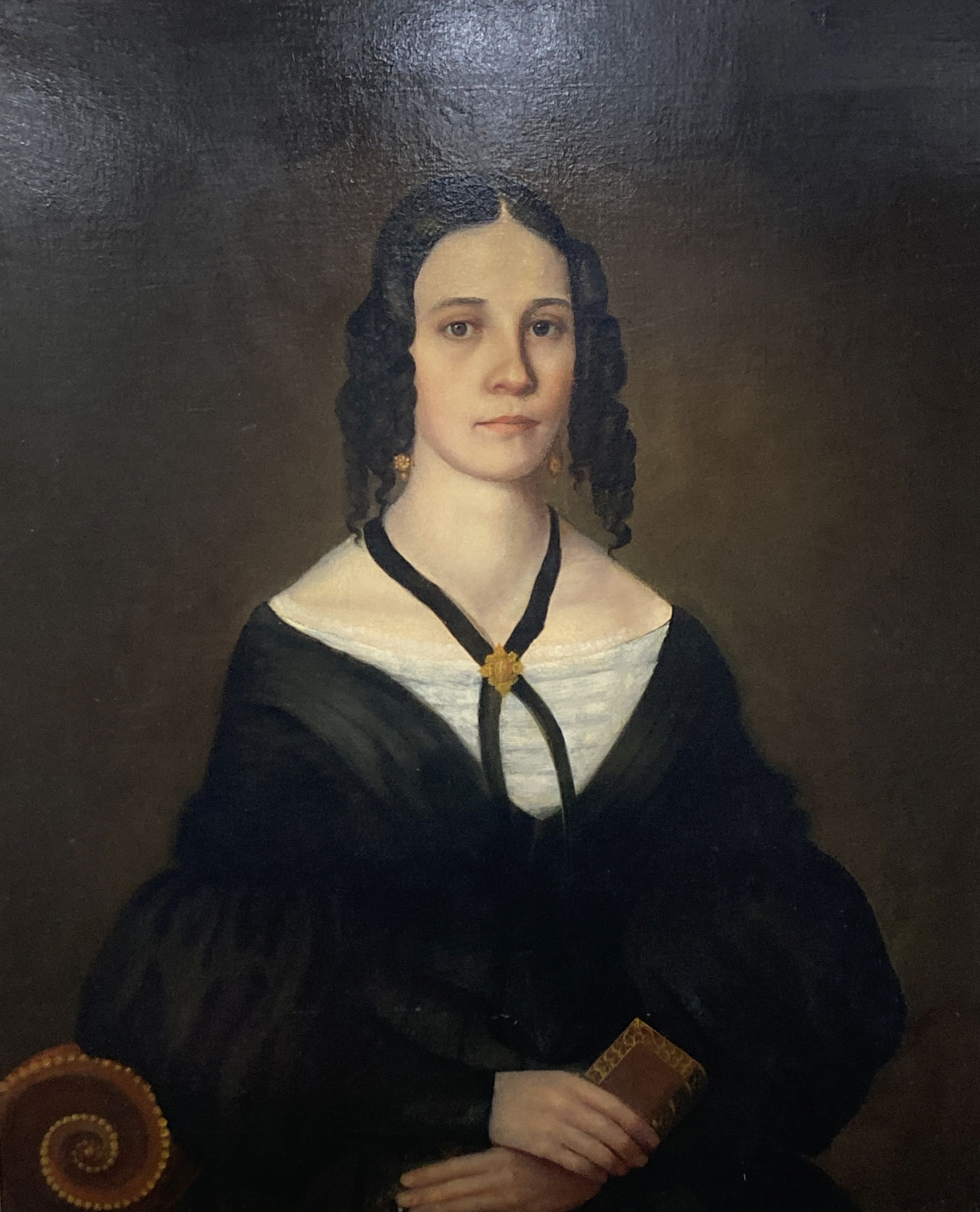 English School c.1840, oil on canvas, Half length portrait of a young lady, 90 x 75cm